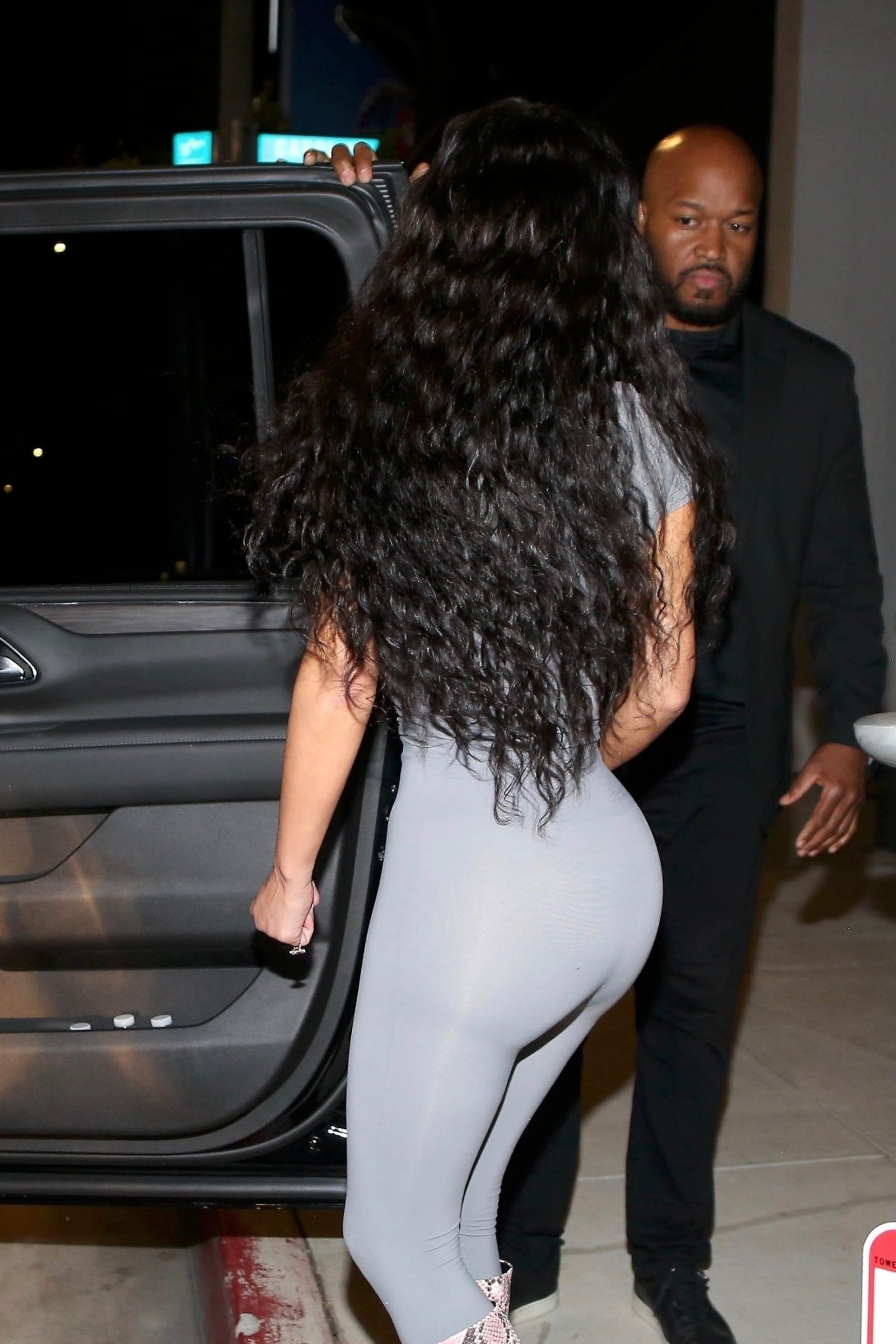Kim Kardashian Displays Her Curves In Nude Spandex Bodysuit